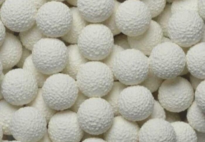 A pile of textured white candy balls, a sweet treat from good memories of life in the 80s.