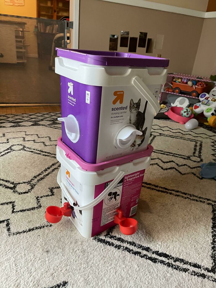 Two repurposed old junk plastic buckets stacked, demonstrating creativity.