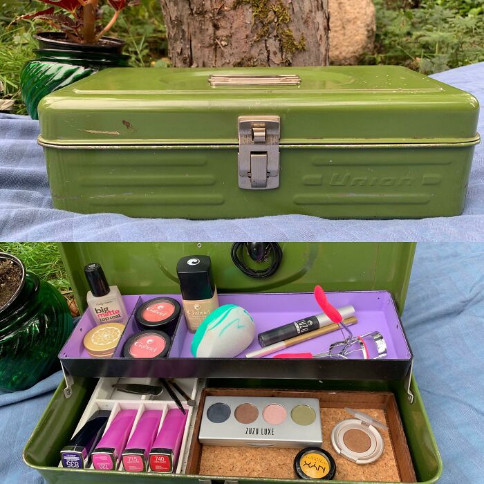 A green metal toolbox repurposed into a makeup organizer, demonstrating creativity turning old junk into storage.