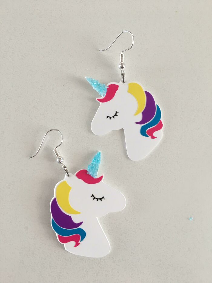 A pair of adorable unicorn earrings, showing how creativity can turn simple materials into something worth keeping.