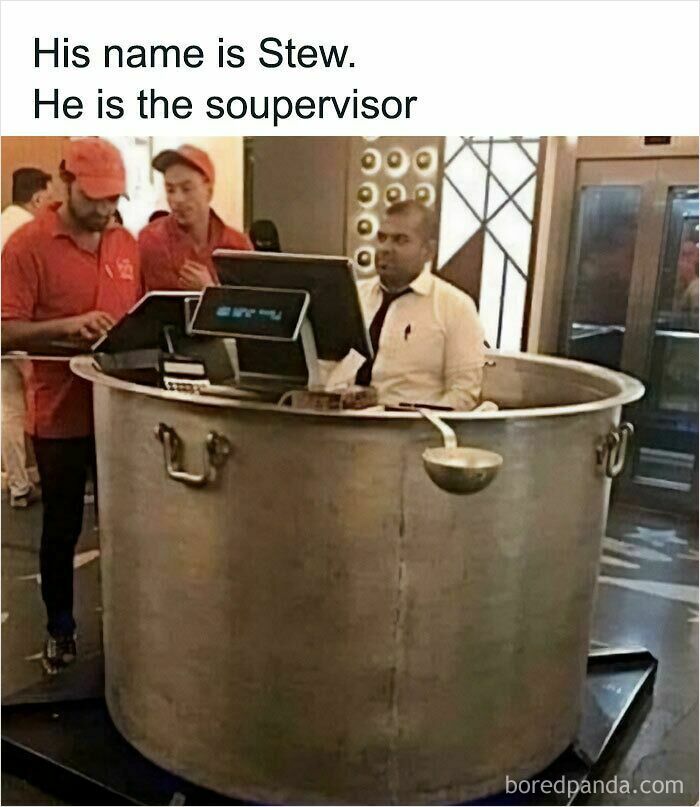 A man sitting inside a giant cooking pot at a desk, with the dumb pun 'soupervisor'.