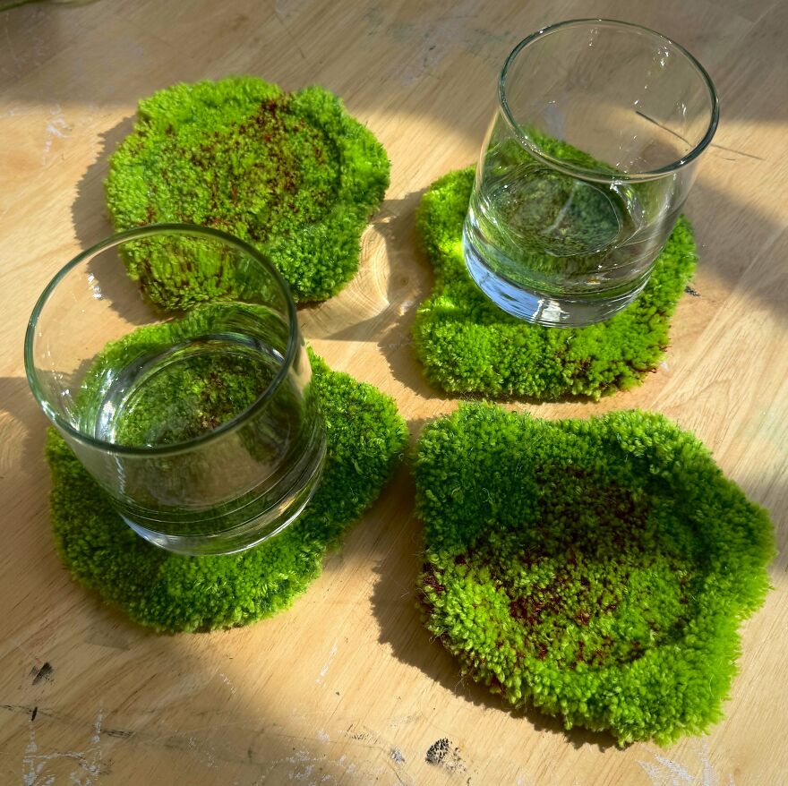 Whimsical crafts: Green moss coasters with glasses, adding a magical touch to home decor.