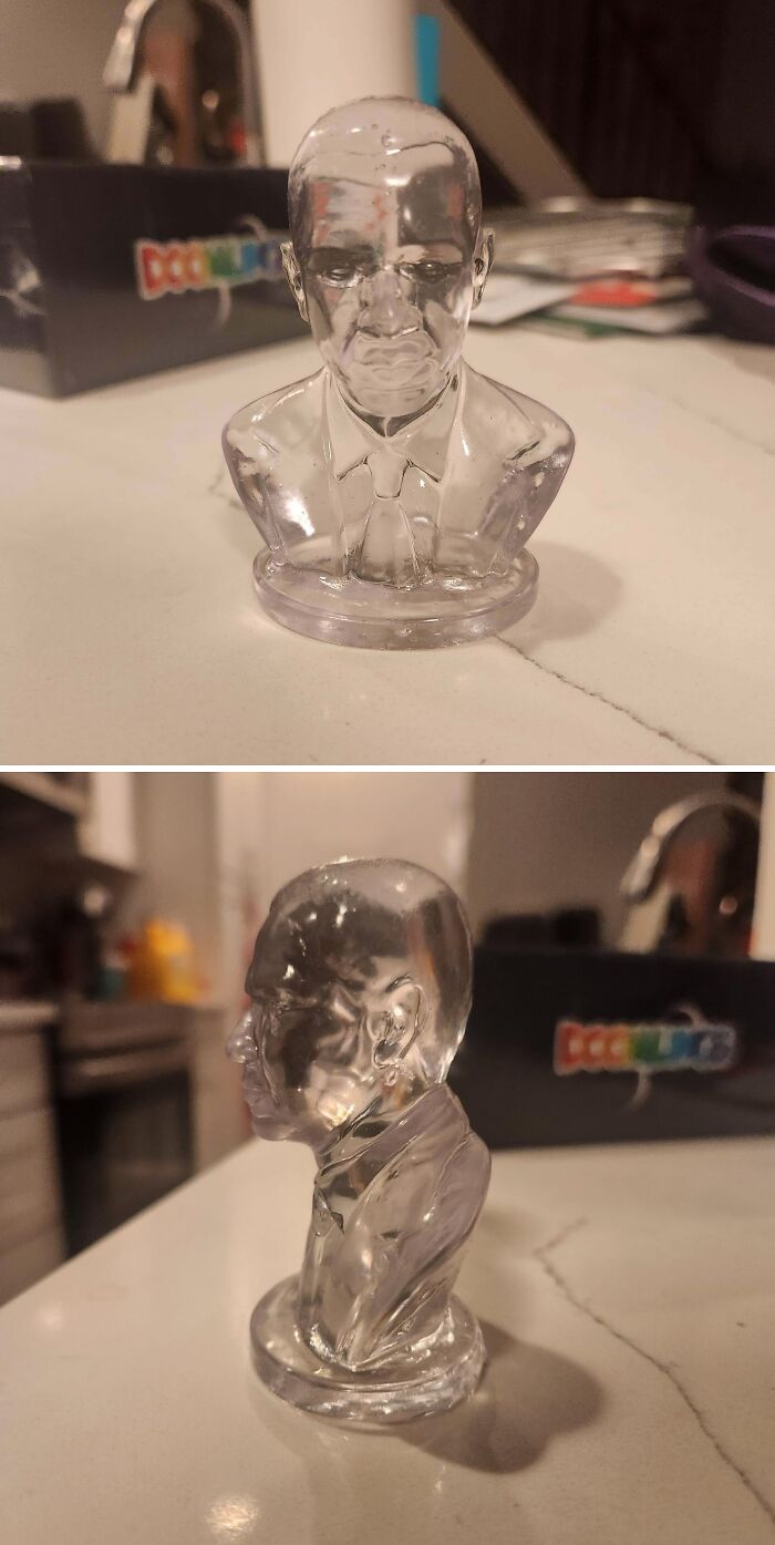 A clear 3D printer bust of a man in a suit, showcasing cool 3D projects.