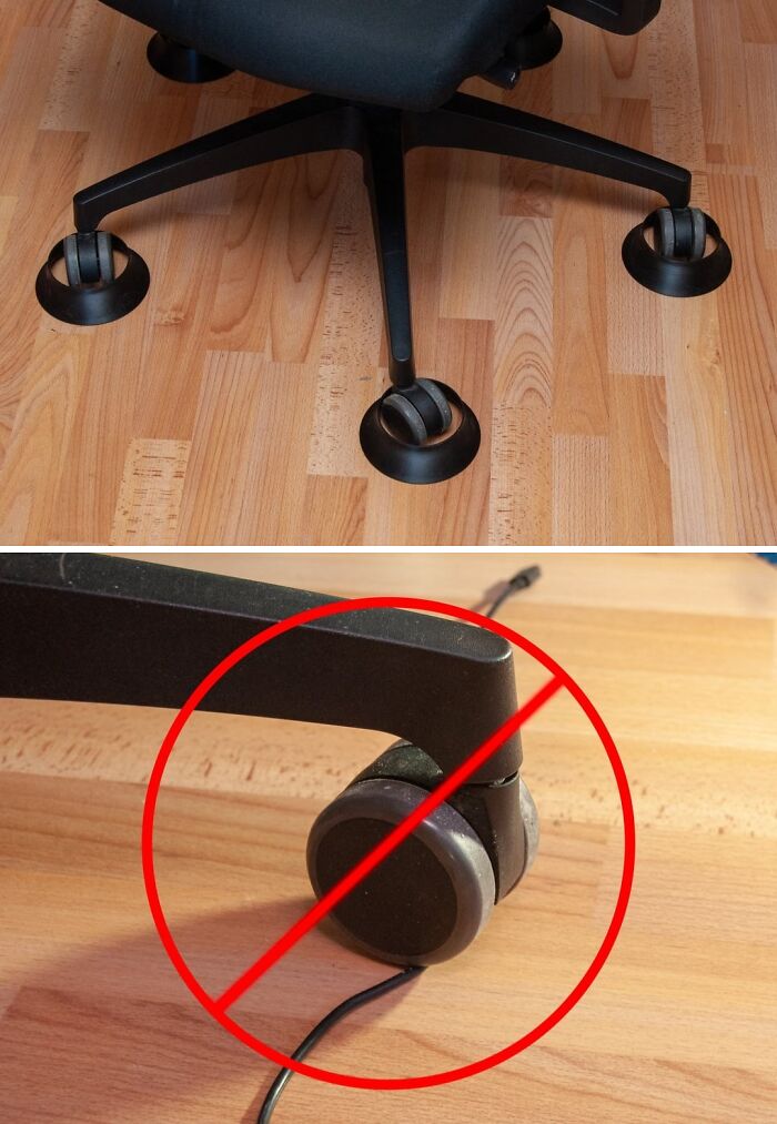 A close-up of an office chair base with custom 3D printed wheels designed to protect wooden floors.