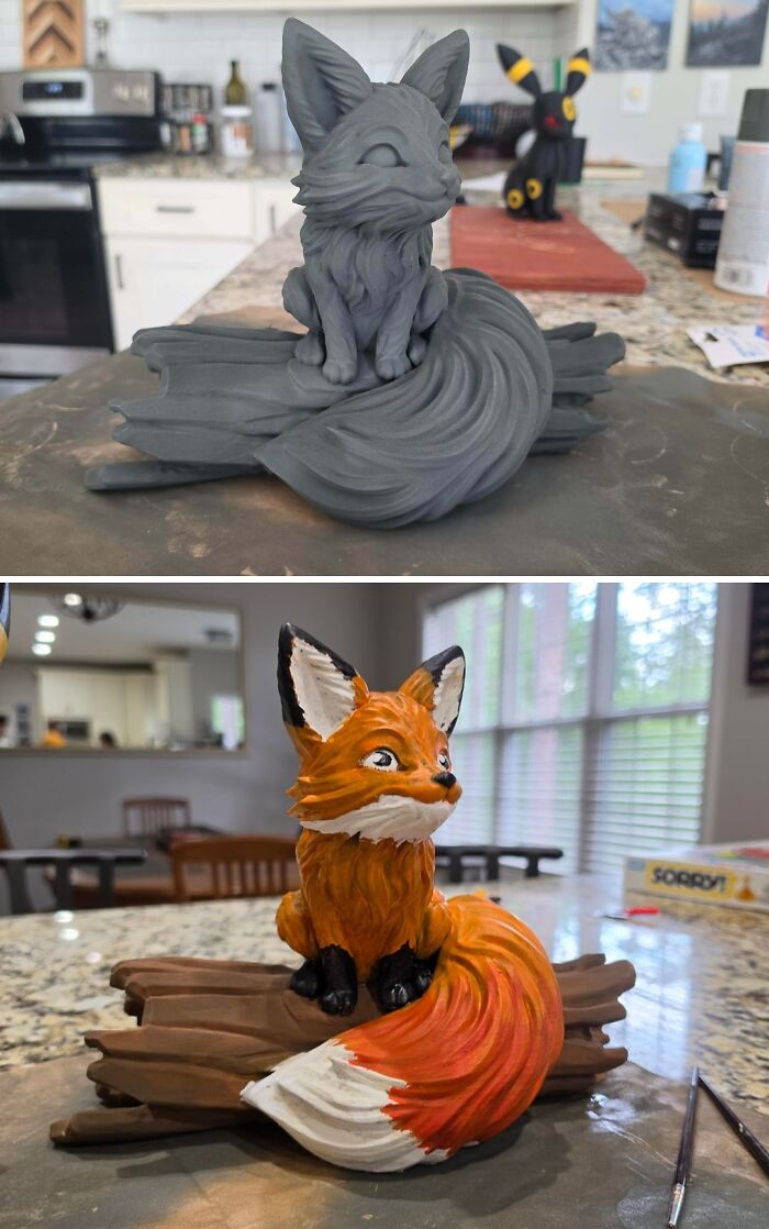 A charming 3D printed fox figurine, initially gray, then painted with vibrant orange and white details, a cool project.