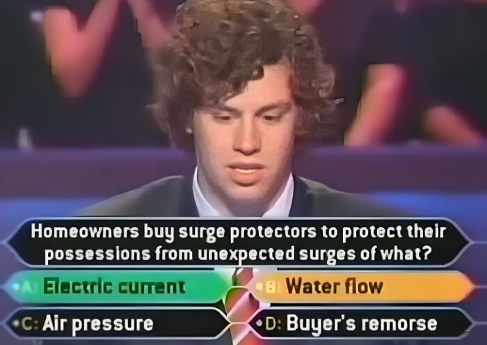 A young male contestant on Who Wants To Be A Millionaire looking confused by a dumb answer question.