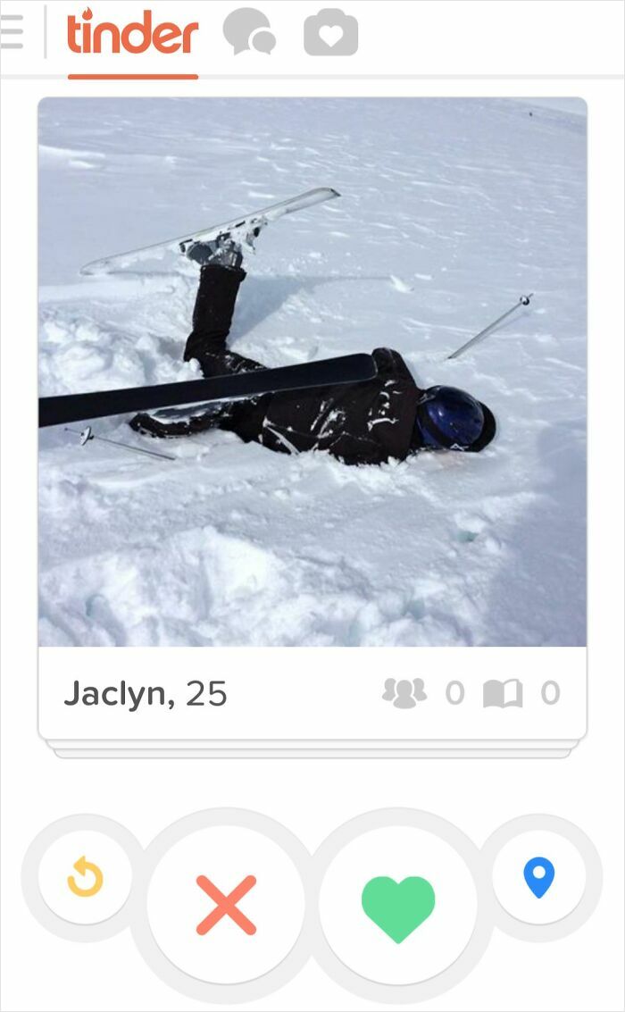 A person fallen face down in deep snow with skis sticking up, a cringe Tinder profile.