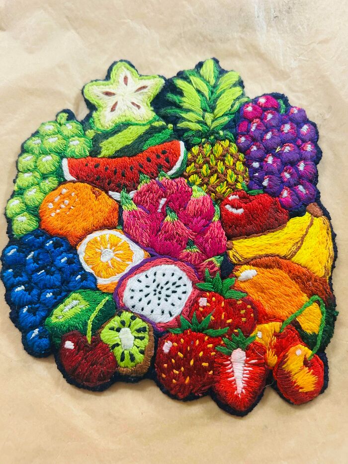 Vibrant and colorful embroidered fruit collage embroidery project