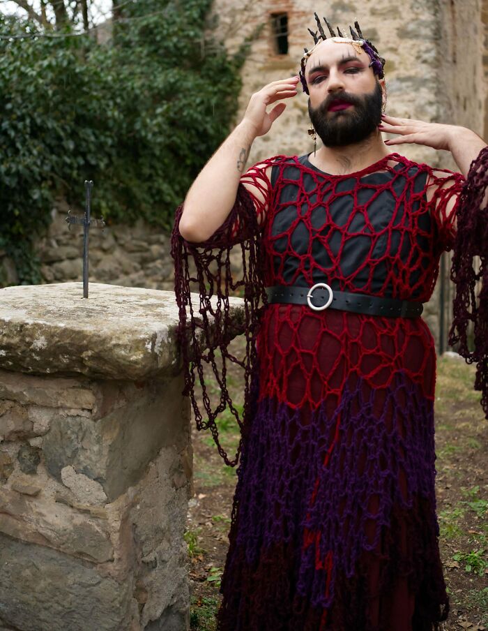 A person models a unique DIY crochet outfit outdoors, showcasing creative crochet creations.