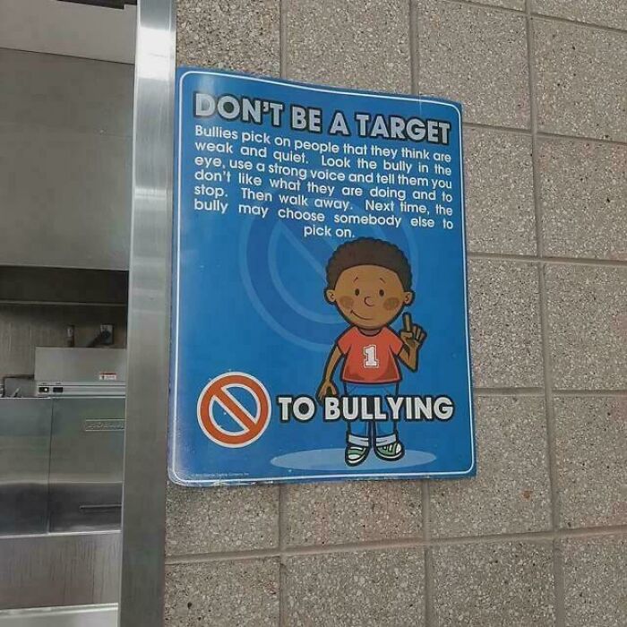 A blue sign with a cartoon child saying DON'T BE A TARGET as worst pieces of advice against bullying.