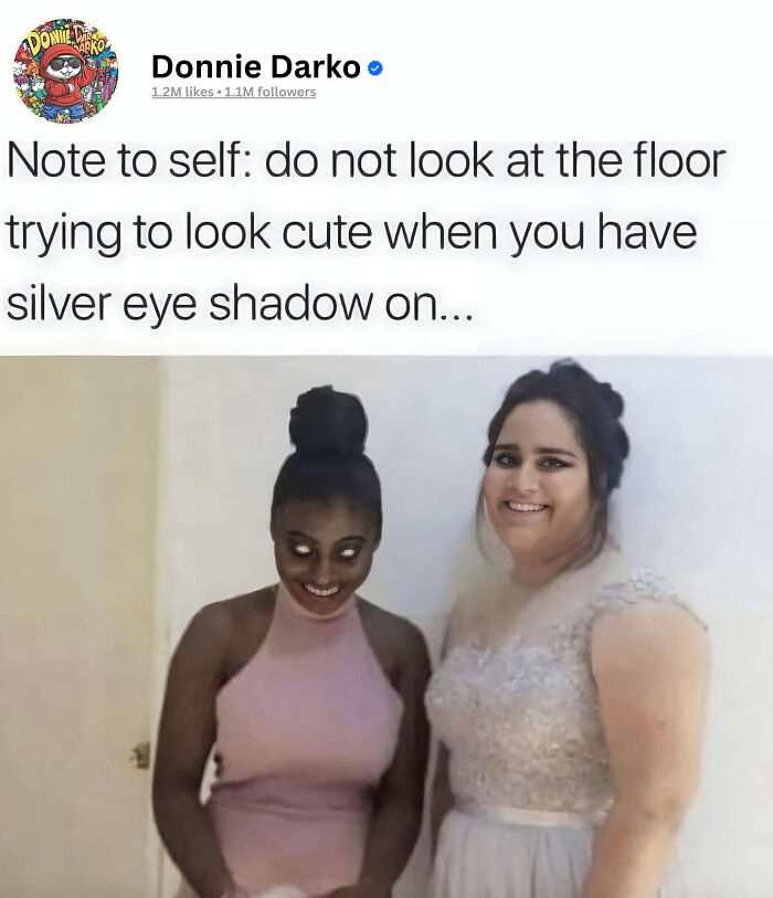 A creepy image of a woman with glowing white eyes and a wide smile standing next to another woman.
