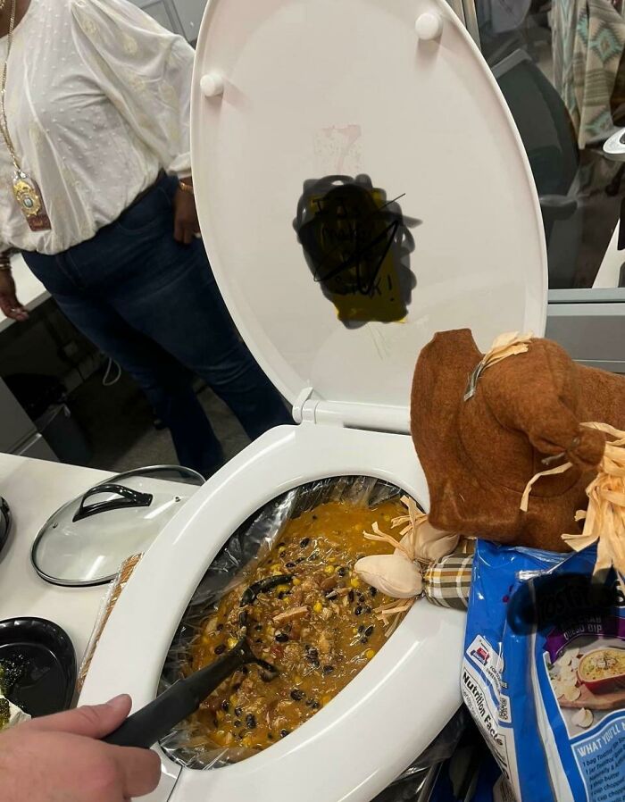 Chili served in a toilet bowl, a truly disgusting food presentation.