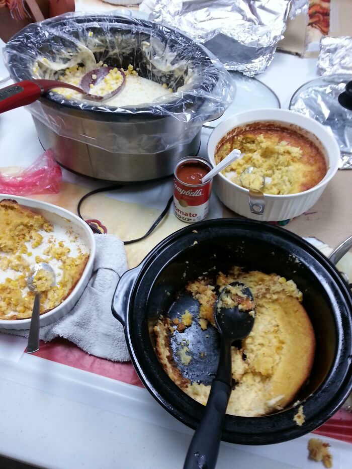 Several dishes of what appears to be corn casserole, representing disgusting food that deserves to be publicly shamed.