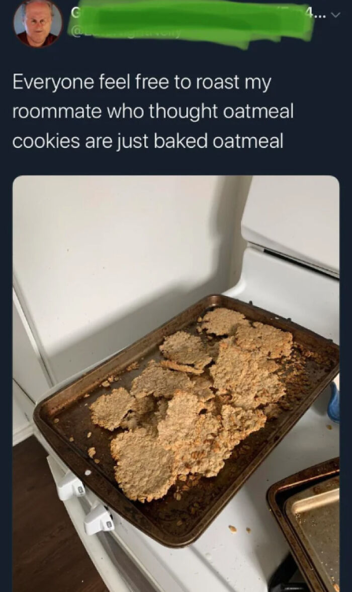 A baking sheet with several flat, crumbly, and unappetizingly pale oatmeal cookies, an example of disgusting food.