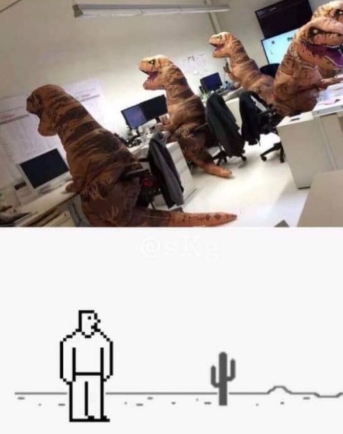 No context humans meme with multiple people in dinosaur costumes working in an office and a pixelated man.