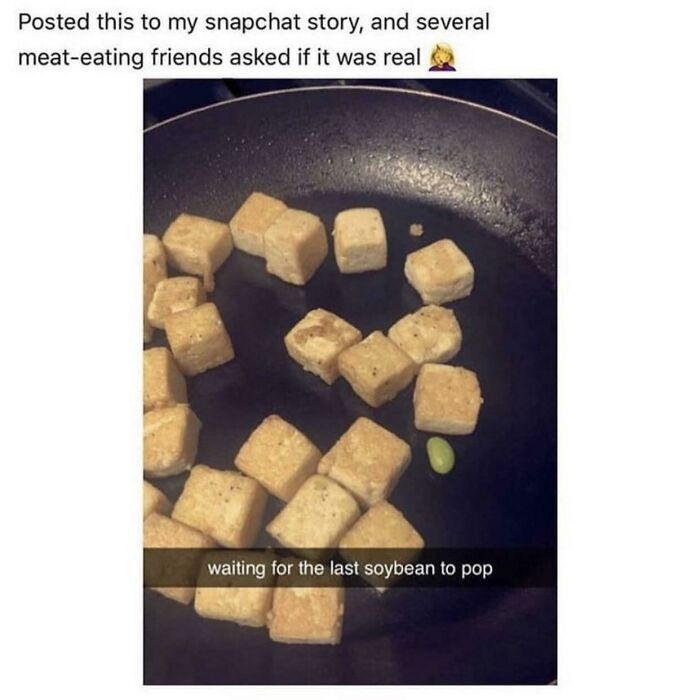 Tofu cubes and a single soybean in a frying pan, with a Snapchat caption about waiting for it to pop, highlighting stupid vegan food.