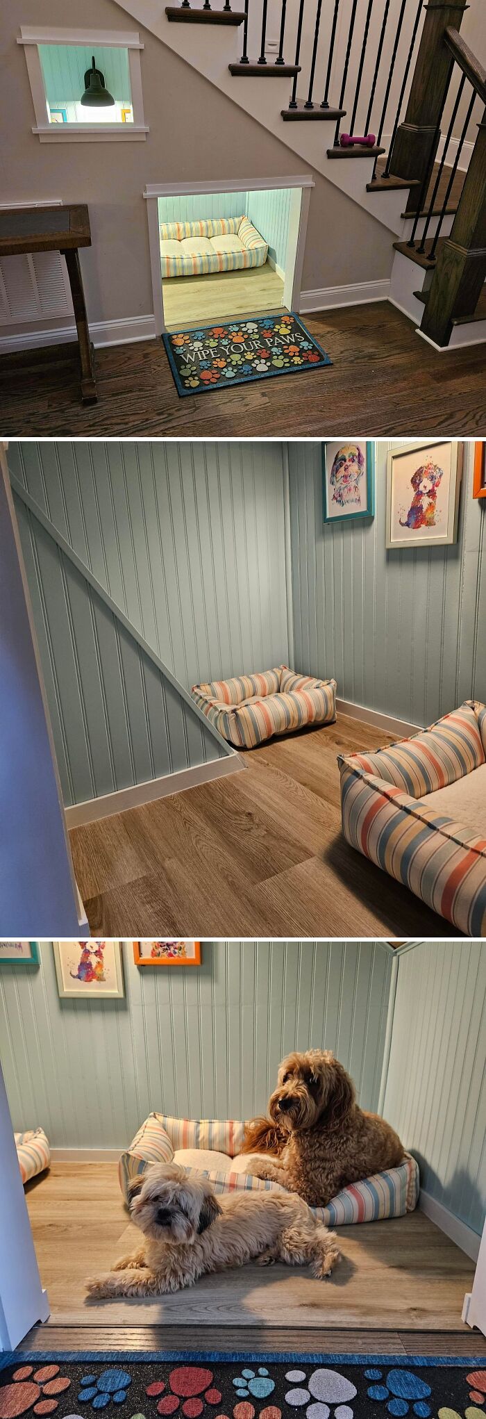 A cozy dog nook under the stairs, with dog beds and artwork, highlighting creative home DIY projects.