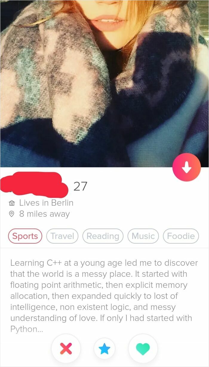 A cringe Tinder profile with a woman's bio discussing programming languages like C++ and Python.