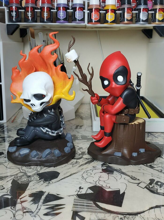 Ghost Rider and Deadpool figures 3D printed for a cool display.