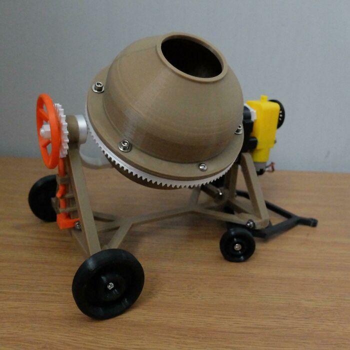 A miniature 3D printed cement mixer, a cool and useful item made with 3D printers.