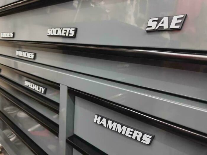 A close-up of a grey toolbox with labels like SAE, SOCKETS, WRENCHES, SPECIALTY, and HAMMERS, showcasing cool things people printed with their 3D printers.