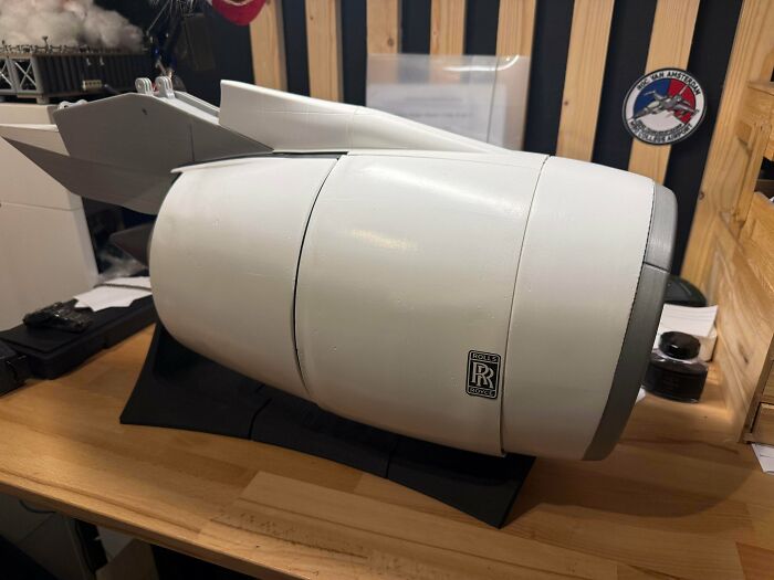 A detailed white and grey Rolls-Royce jet engine model, one of the cool things people printed with their 3D printers.