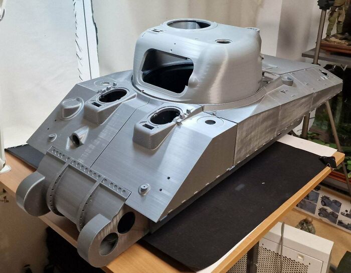 A large, grey 3D printed tank model, a cool thing people printed with their 3D printers.