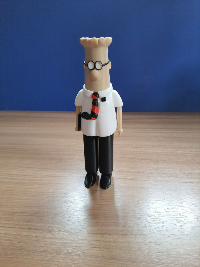 A 3D printed figurine of Dilbert, a useful thing people printed with their 3D printers.