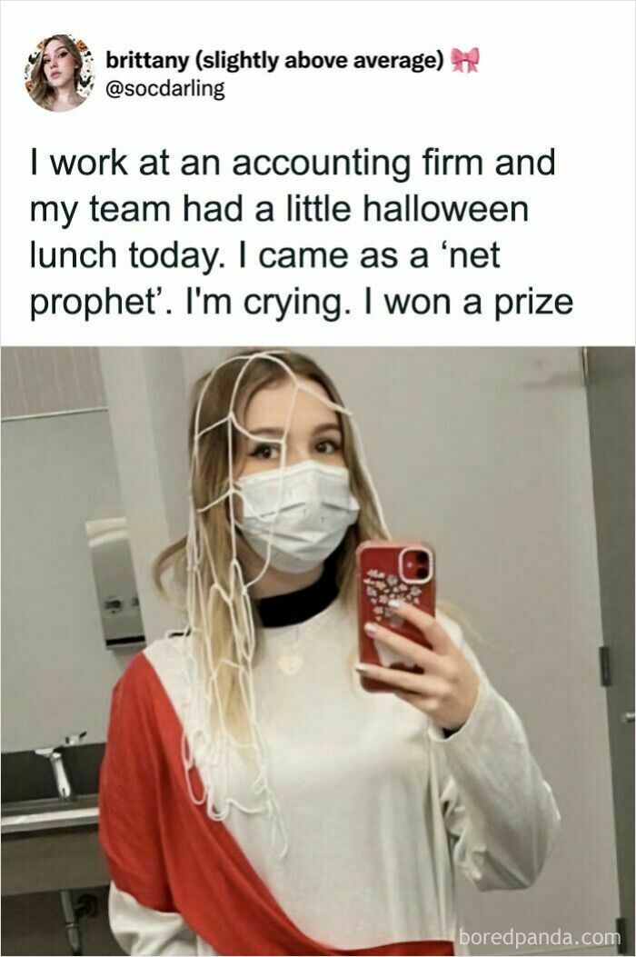 A woman dressed as a 'net prophet' for Halloween, a clever visual dumb pun.