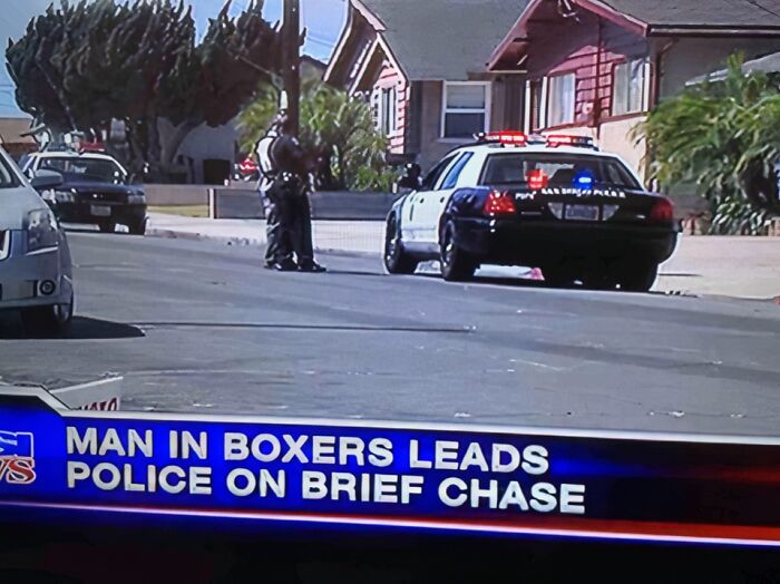 A TV screen showing a news headline about a man in boxers leading police on a brief chase, an incredibly dumb pun.