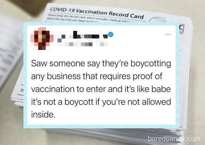 A tweet overlaid on a stack of COVID-19 Vaccination Record Cards, discussing the stupidity of boycotting businesses that require vaccination proof.
