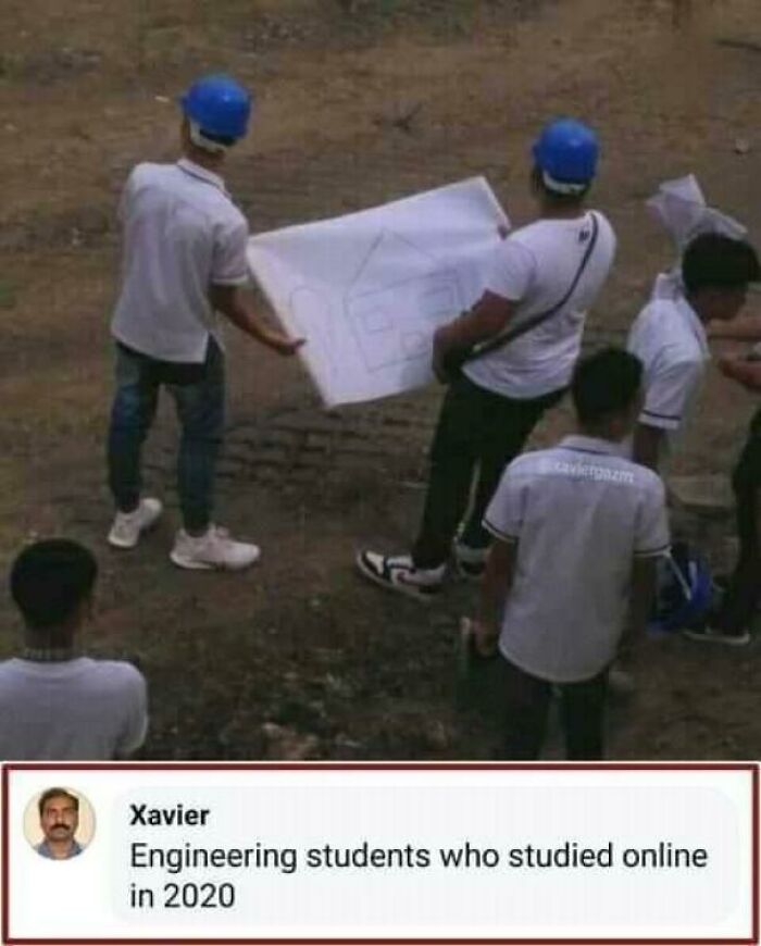 Engineering students in hard hats hold a small, crude drawing of a house, an unfortunate display of stupidity.