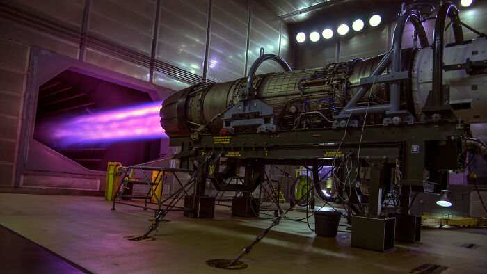 A powerful jet engine firing up, showcasing genius technologies that make everyday life easier with incredible power.