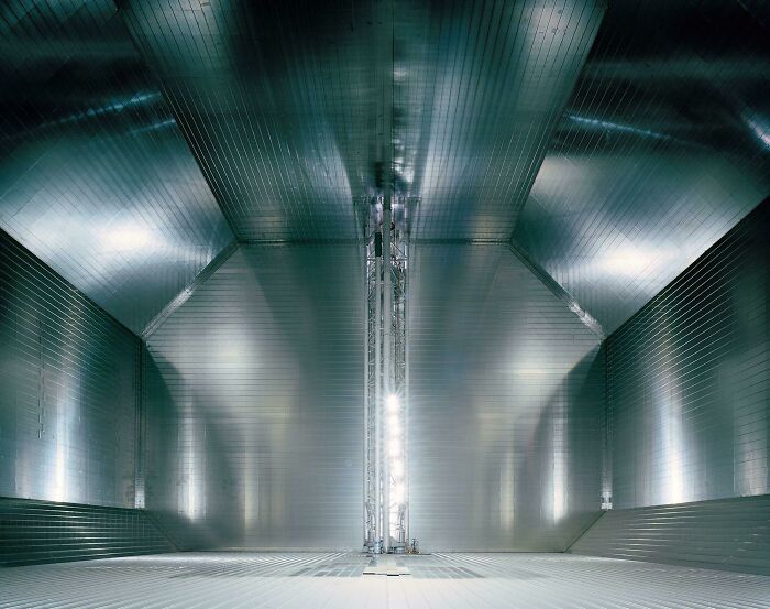 The vast, reflective interior of a large facility, highlighting advanced genius technologies.