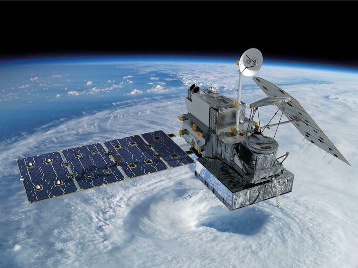 A satellite orbiting Earth, showcasing advanced technologies for observation and communication that simplify everyday life.