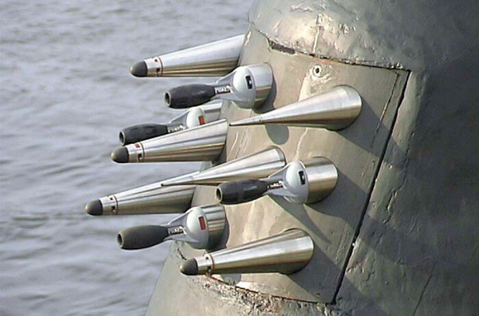 A close-up of advanced technologies, sleek sensors protruding from a metal surface near water, symbolizing ingenious technologies.