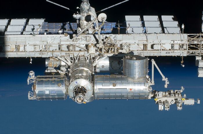 International Space Station orbiting Earth, an example of genius technologies that make everyday life easier.