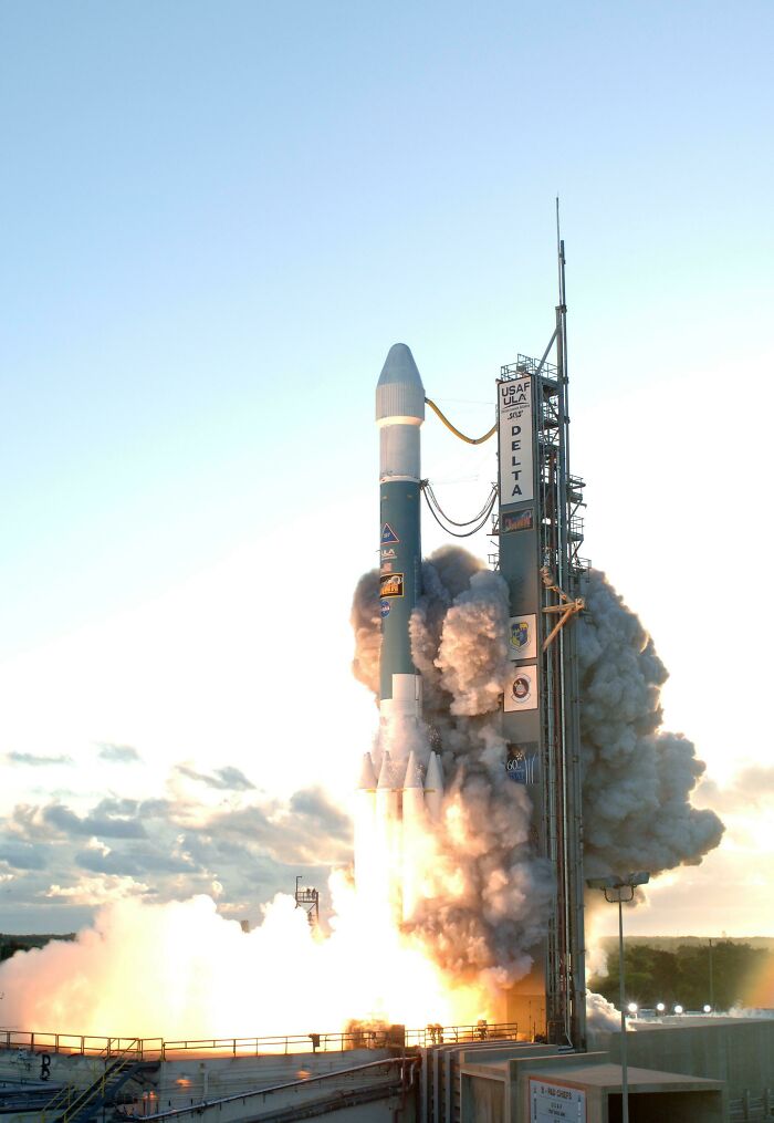 A Delta rocket launch, showcasing genius technologies that make everyday life easier with a powerful display of engineering.