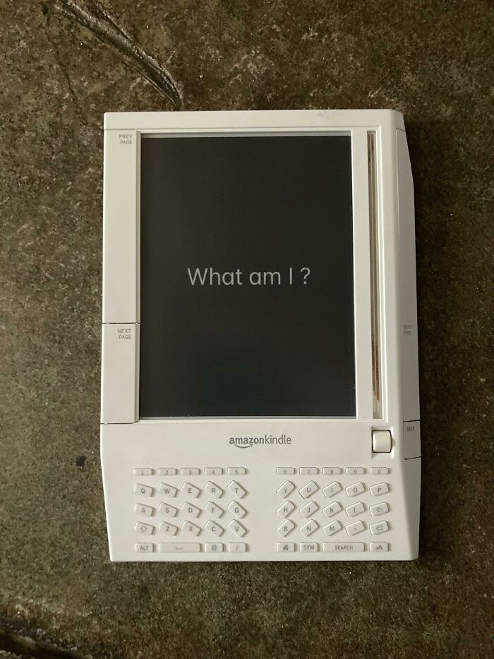 An Amazon Kindle, an example of genius technologies that make everyday life easier, displaying the question What am I?