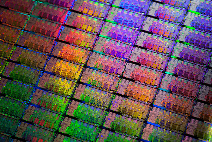 A colorful, detailed close-up of computer chips, representing advanced technologies that make everyday life easier.