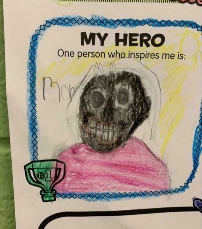 A child's drawing of a creepy and confusing hero, possibly a mother figure, with dark, smudged features on a My Hero worksheet.