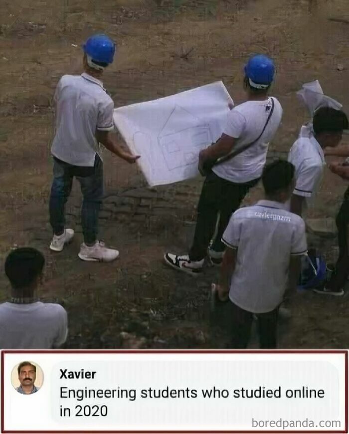 Engineering students in hard hats hold a small, crude drawing of a house, an unfortunate display of stupidity.