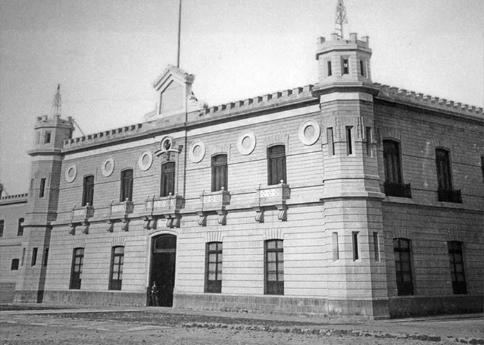 An old building, potentially a jail or courthouse, connected to the street fight's chilling chain of events. An old building, potentially a jail or courthouse, connected to the street fight's chilling chain of events.