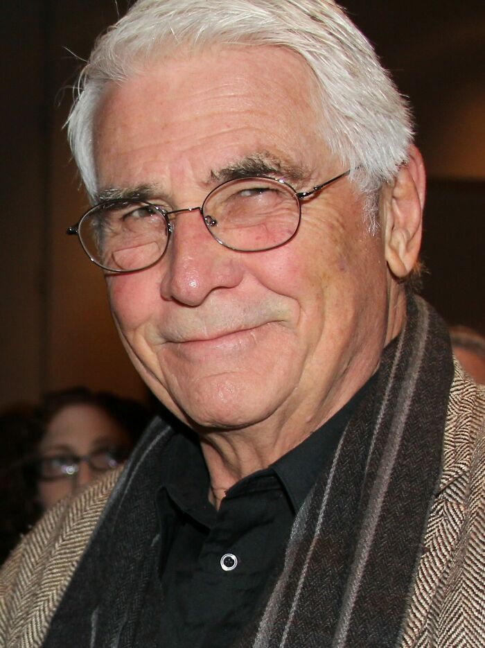 James Brolin, a distinguished actor, smiles warmly in a close-up, showcasing his bio and career highlights.