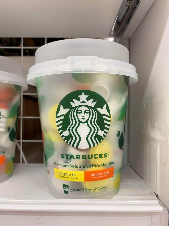 A container of Starbucks premium soluble coffee mini cups, showcasing consumerism in coffee products.