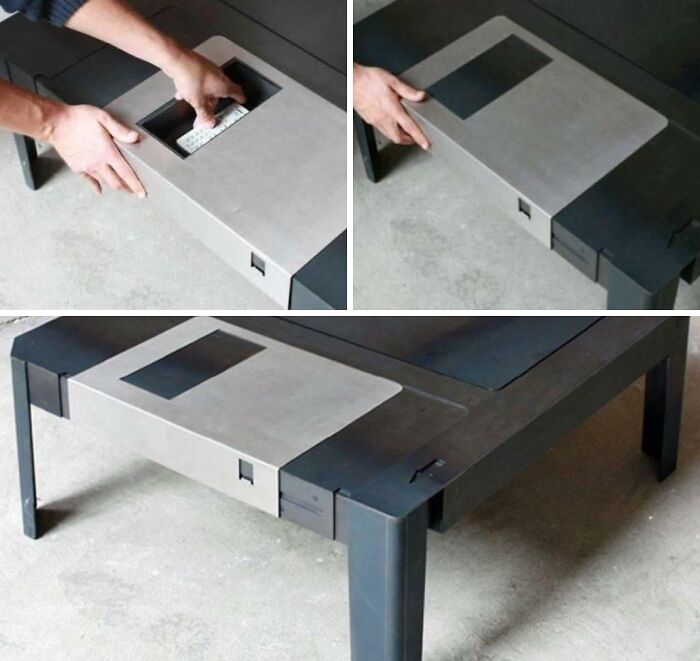 A person opening a hidden compartment in a black and grey coffee table, revealing a remote control. Furniture designers.