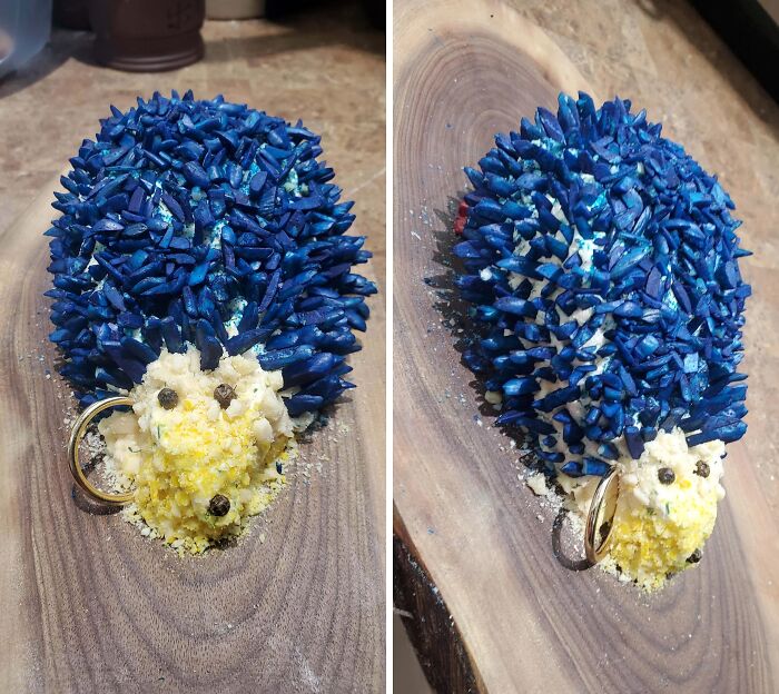 A hedgehog-shaped creation with blue and yellow ingredients, a truly disgusting food presentation.