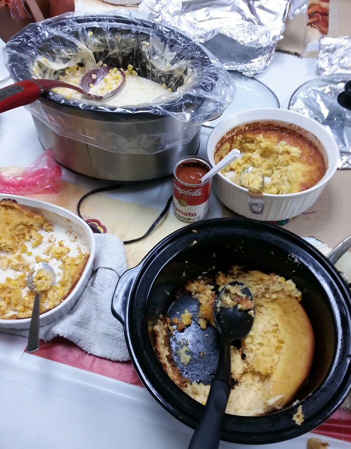 Several dishes of what appears to be corn casserole, representing disgusting food that deserves to be publicly shamed.