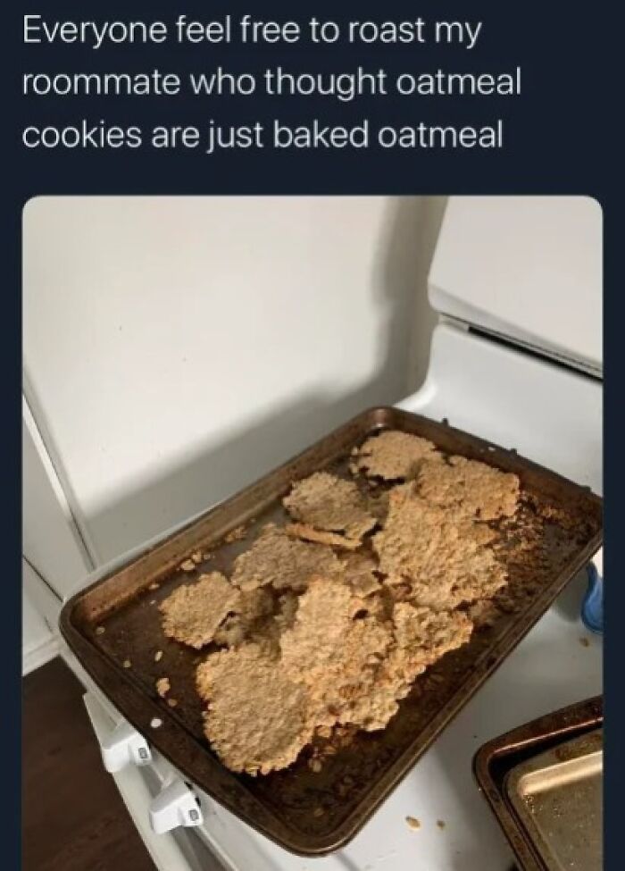 A baking sheet with several flat, crumbly, and unappetizingly pale oatmeal cookies, an example of disgusting food.