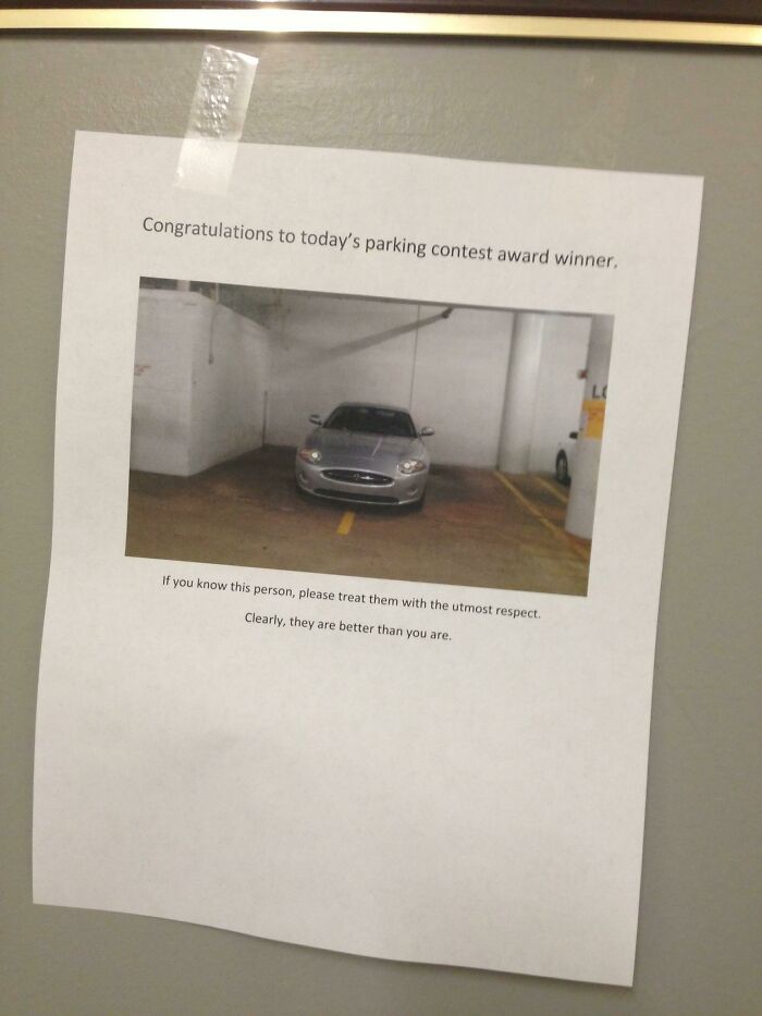 A note mocking a car's outrageous parking, sarcastically calling it a winner.